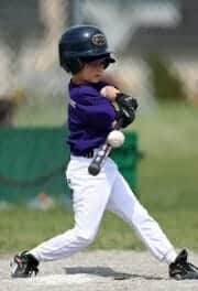 Young Boy Playing Baseball