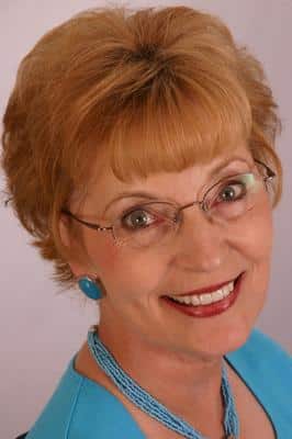 Real patient smiling after dental veneers at Grove City dentist