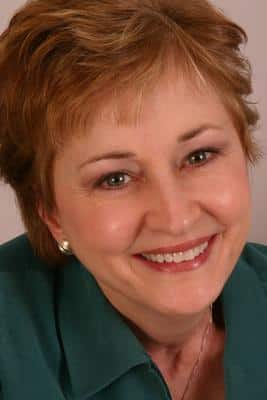 Real patient photo smiling with bright white teeth after professional teeth whitening in Grove City