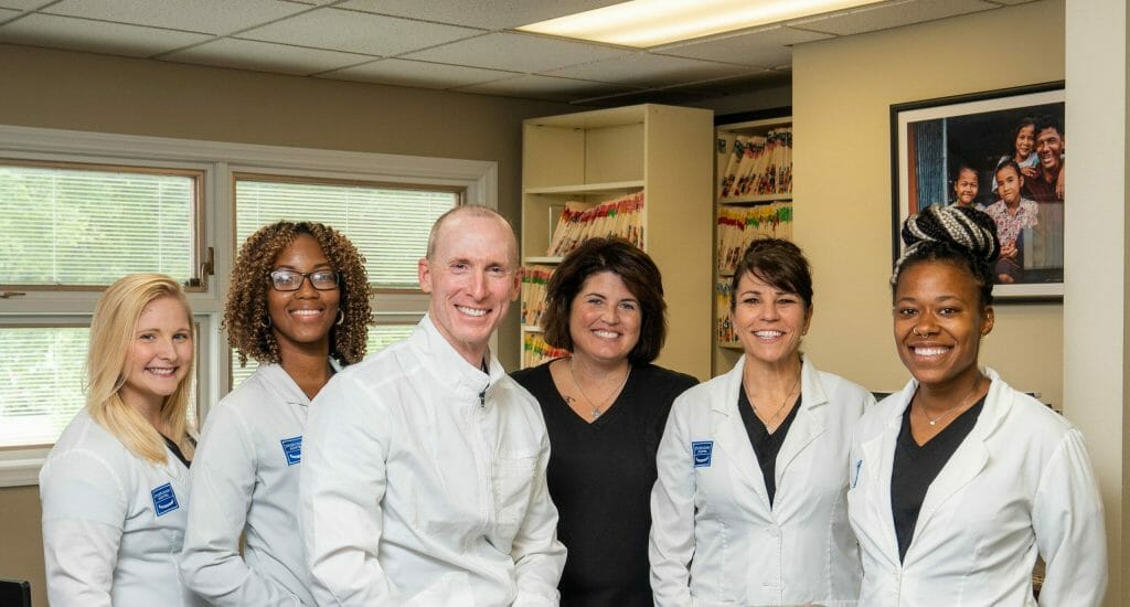 The Sheridan Dental Group team, ready to upgrade smiles.