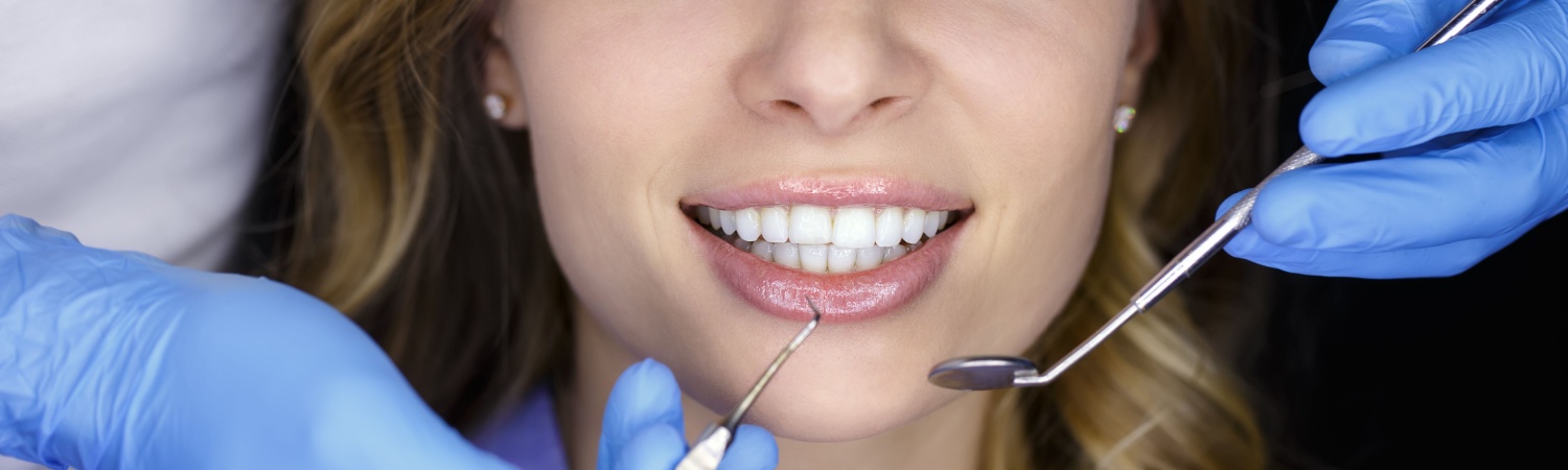 Get rid of tooth stains with whitening treatments at Sheridan Dental Group.